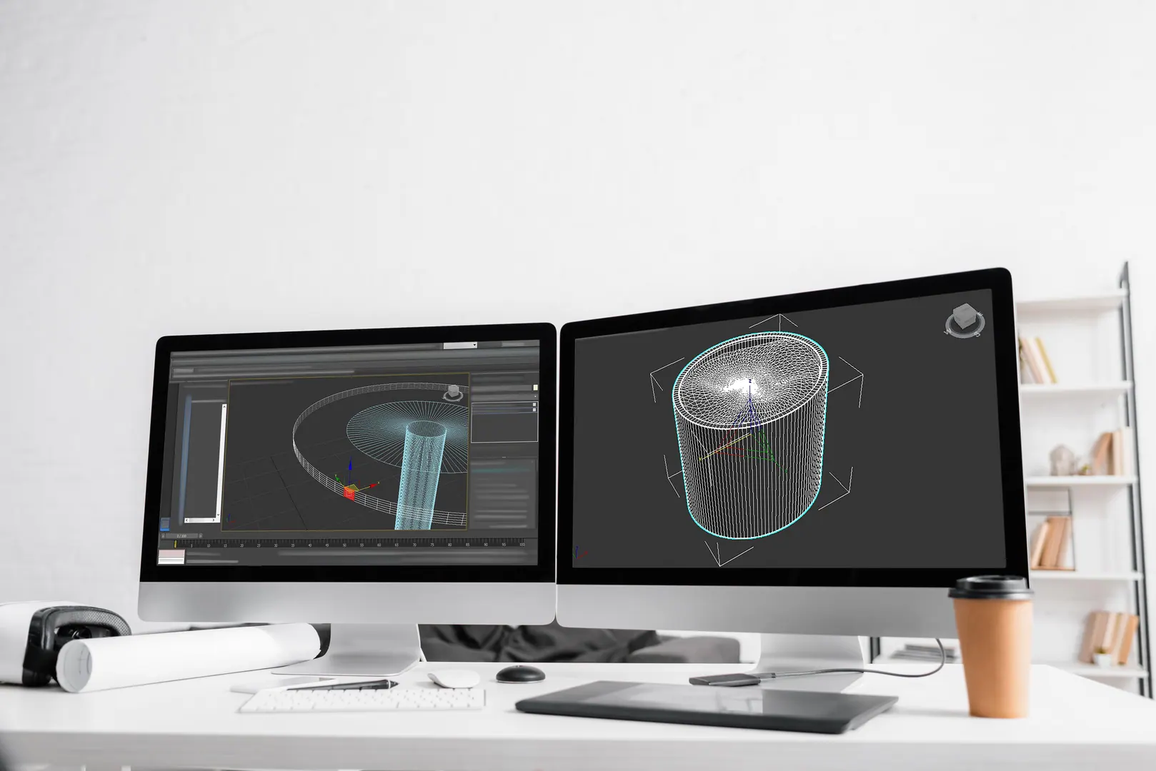Digital engineering workspace with monitors and a graphics tablet