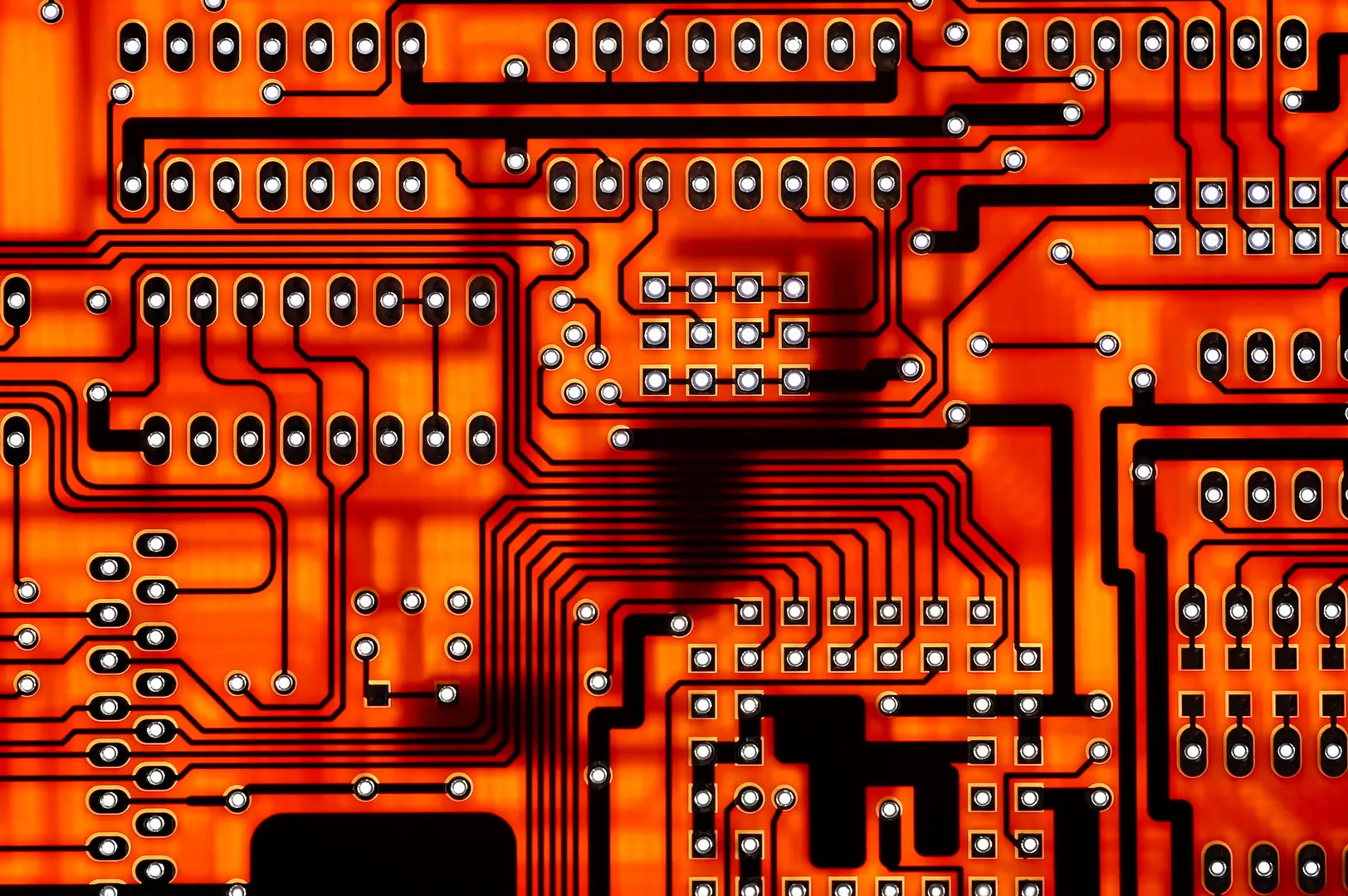 Intricate circuit board background representing CircuitWise engineering